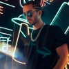 a guy in front of a wall with lights