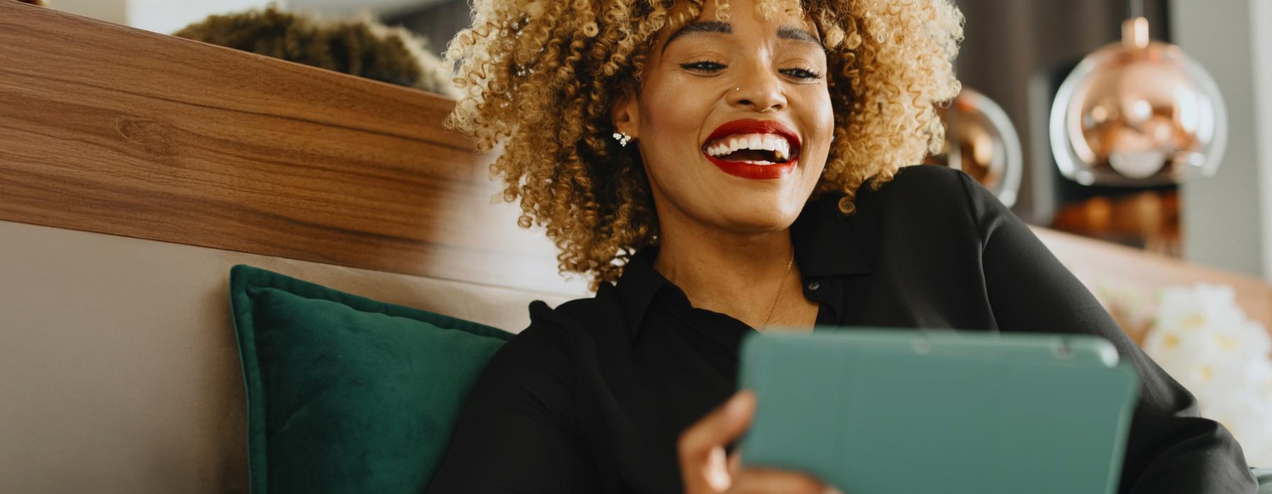 a woman holding a laptop