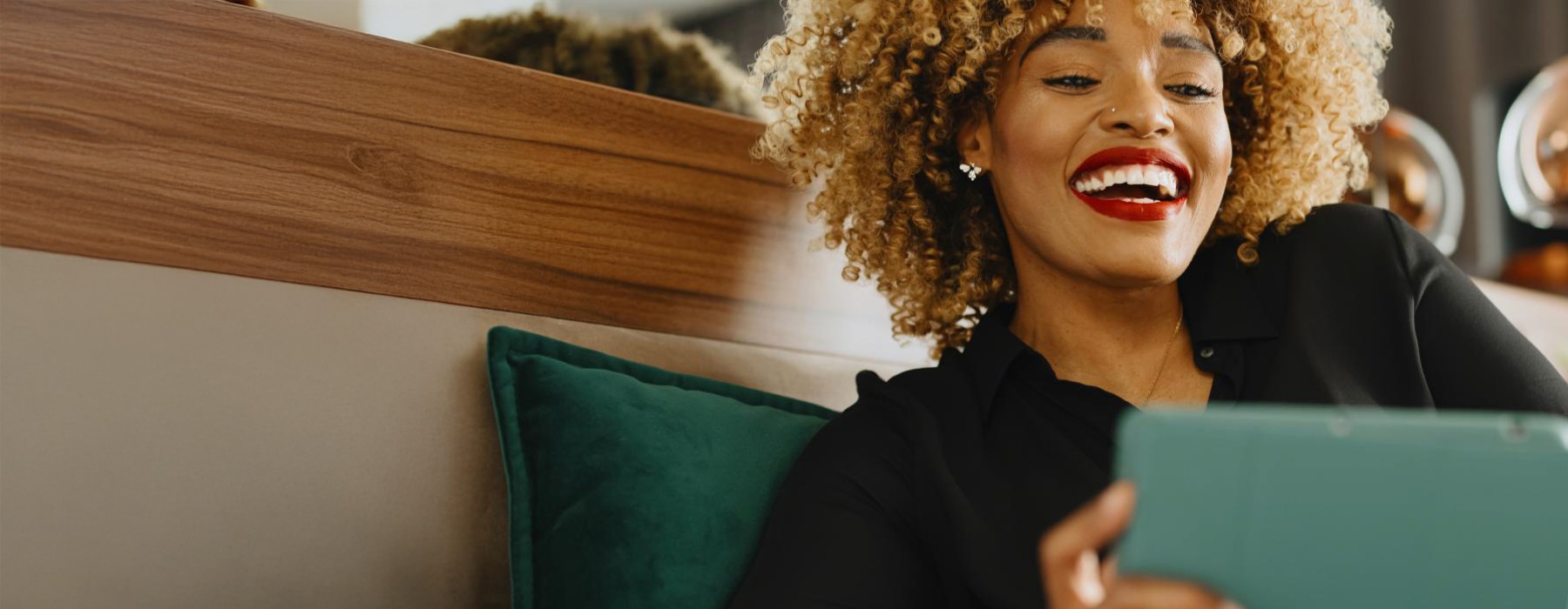 a woman holding a laptop